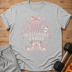 Grey t-shirt with "CUTE OUTFIT. QUESTIONABLE CARDIO." text and pink graphic.
