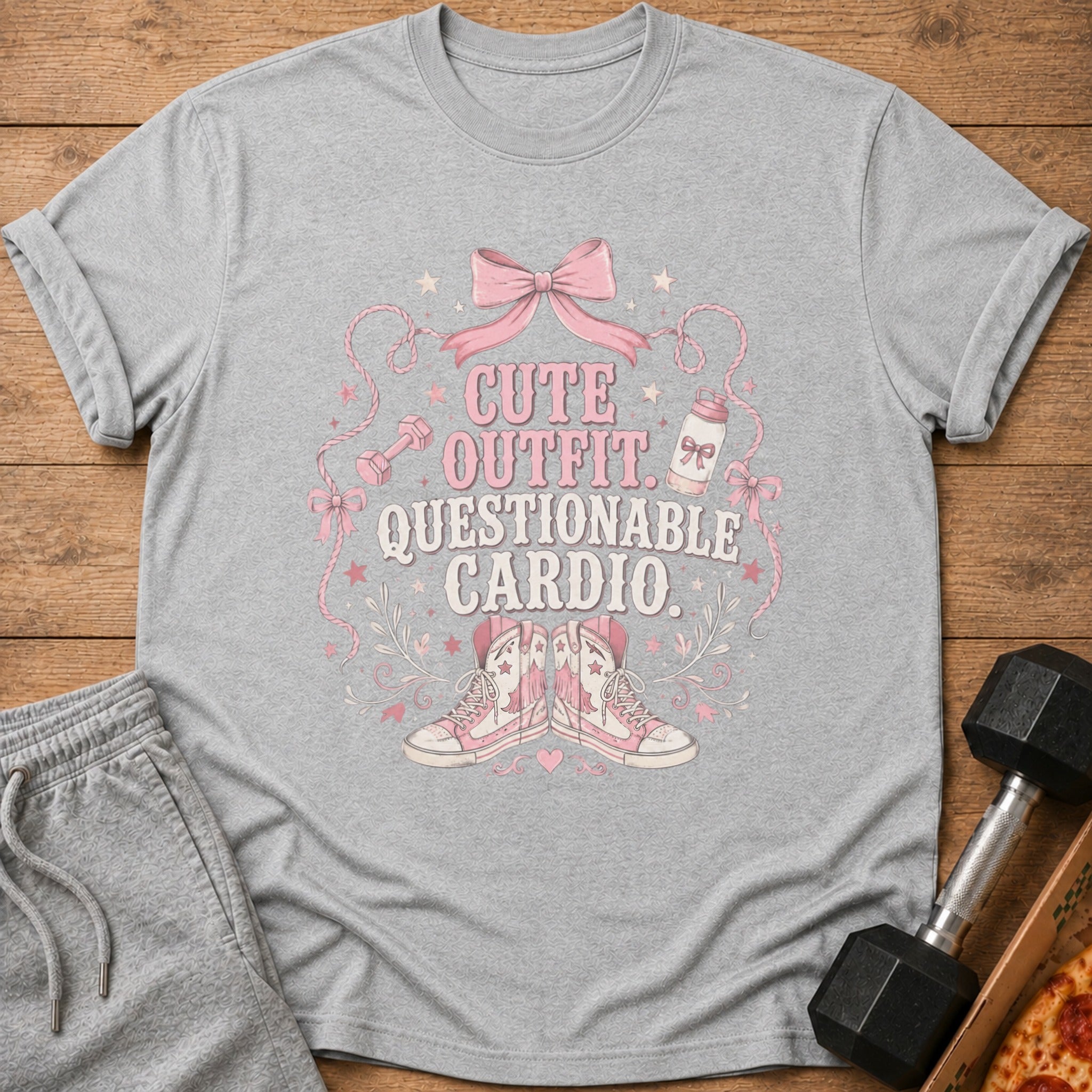 Grey t-shirt with "CUTE OUTFIT. QUESTIONABLE CARDIO." text and pink graphic.