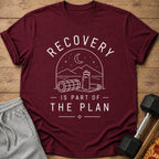 Maroon t-shirt with white text "RECOVERY IS PART OF THE PLAN" and nature graphic.