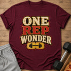 Maroon t-shirt with "ONE REP WONDER" text and dumbbell graphic.