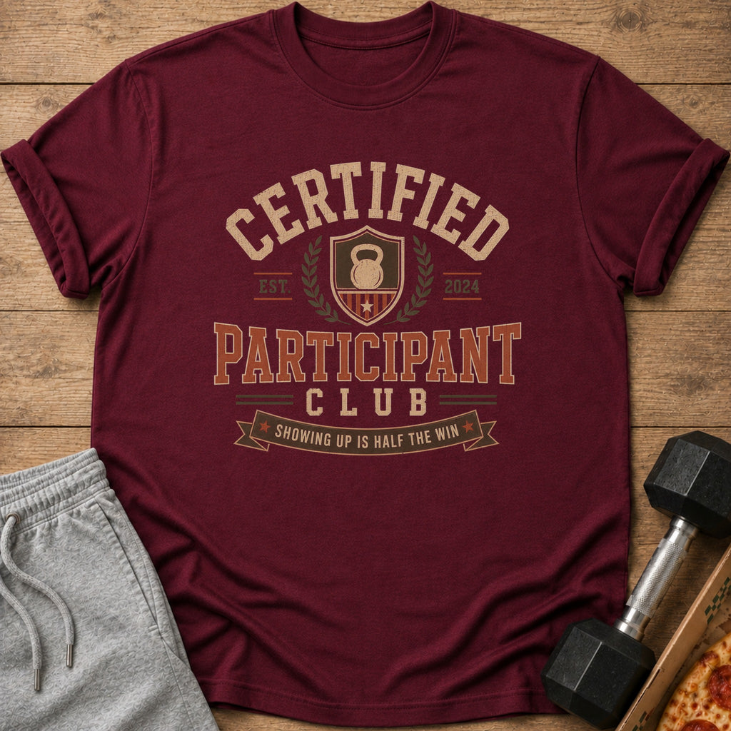 Maroon t-shirt with text "Certified Participant Club" and a kettlebell graphic.