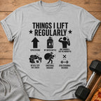 Grey t-shirt with "Things I Lift Regularly" and workout humor graphics.