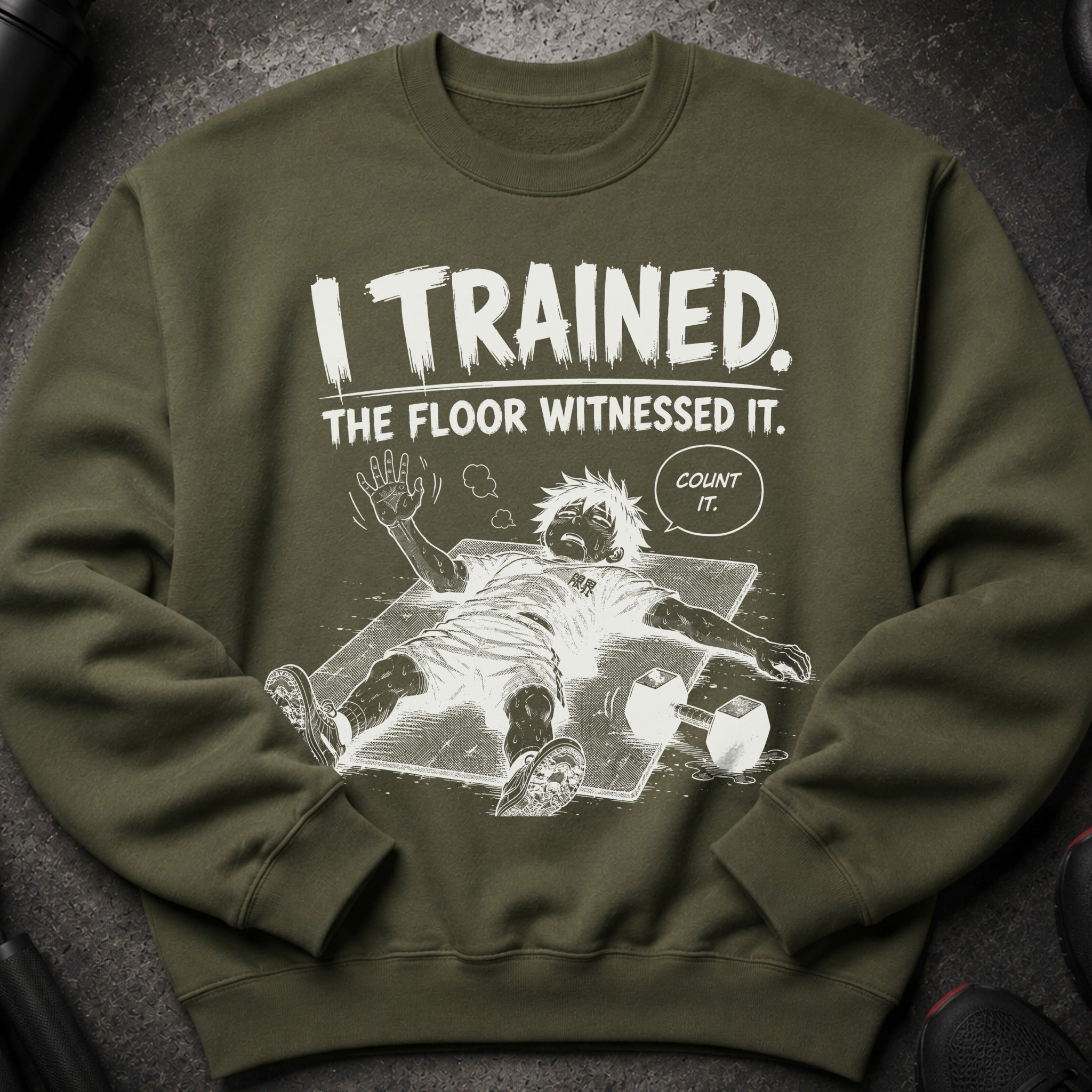 Green sweatshirt with "I TRAINED. THE FLOOR WITNESSED IT. COUNT IT." text and cartoon illustration.
