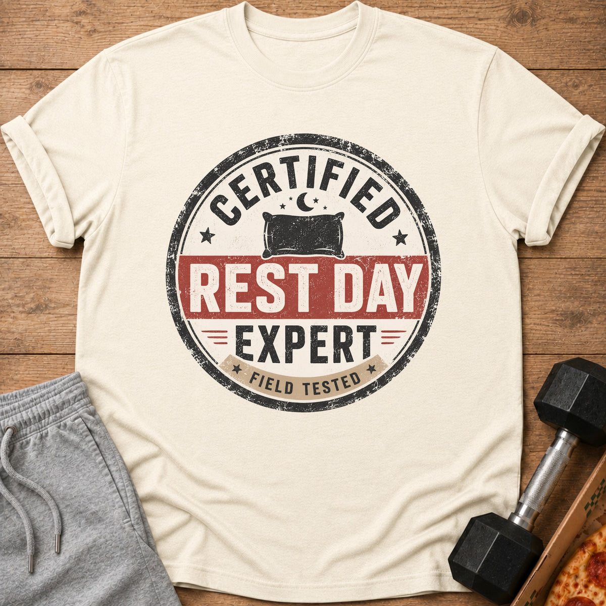 Cream t-shirt with "Certified Rest Day Expert Field Tested" graphic.