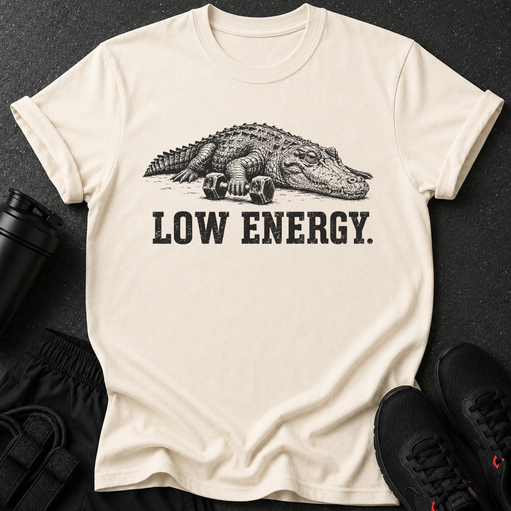 Cream t-shirt with graphic of alligator and dumbbells, text "LOW ENERGY."
