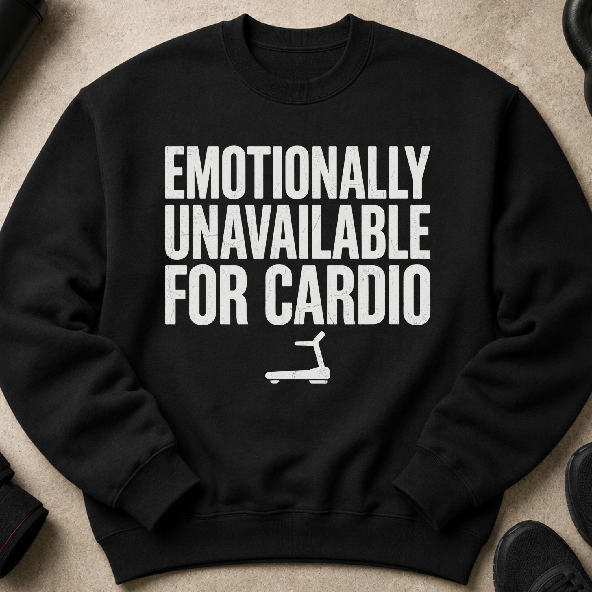 Black sweatshirt with "Emotionally Unavailable For Cardio" text and treadmill graphic.