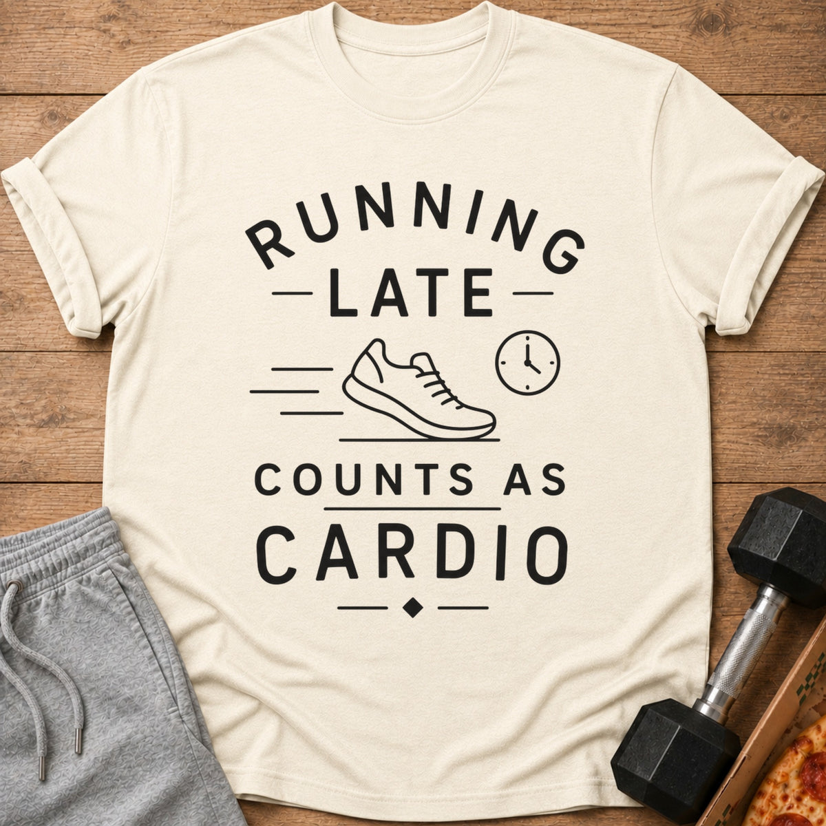 Cream t-shirt with black text "Running Late Counts As Cardio" and shoe graphic.