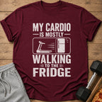 Maroon t-shirt with text "My Cardio Is Mostly Walking To The Fridge" and graphic.