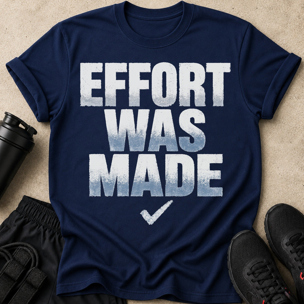 Navy t-shirt with white text "EFFORT WAS MADE" and a checkmark.