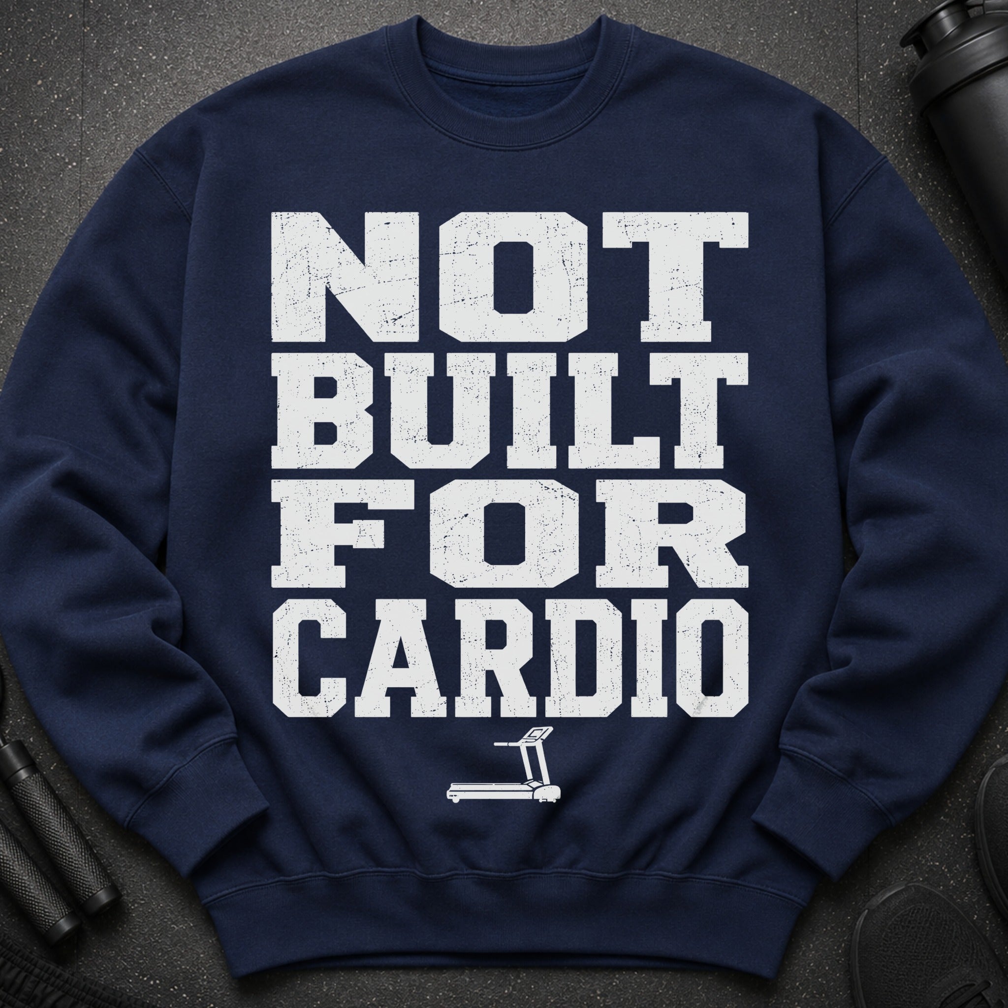 Navy sweatshirt with white distressed text reading "NOT BUILT FOR CARDIO" and a treadmill graphic.