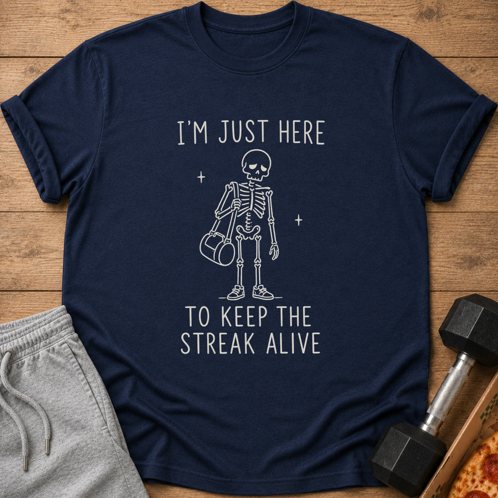 Navy t-shirt with skeleton graphic and text "I'M JUST HERE TO KEEP THE STREAK ALIVE."