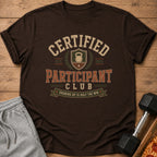 Brown t-shirt with "Certified Participant Club" and kettlebell graphic.