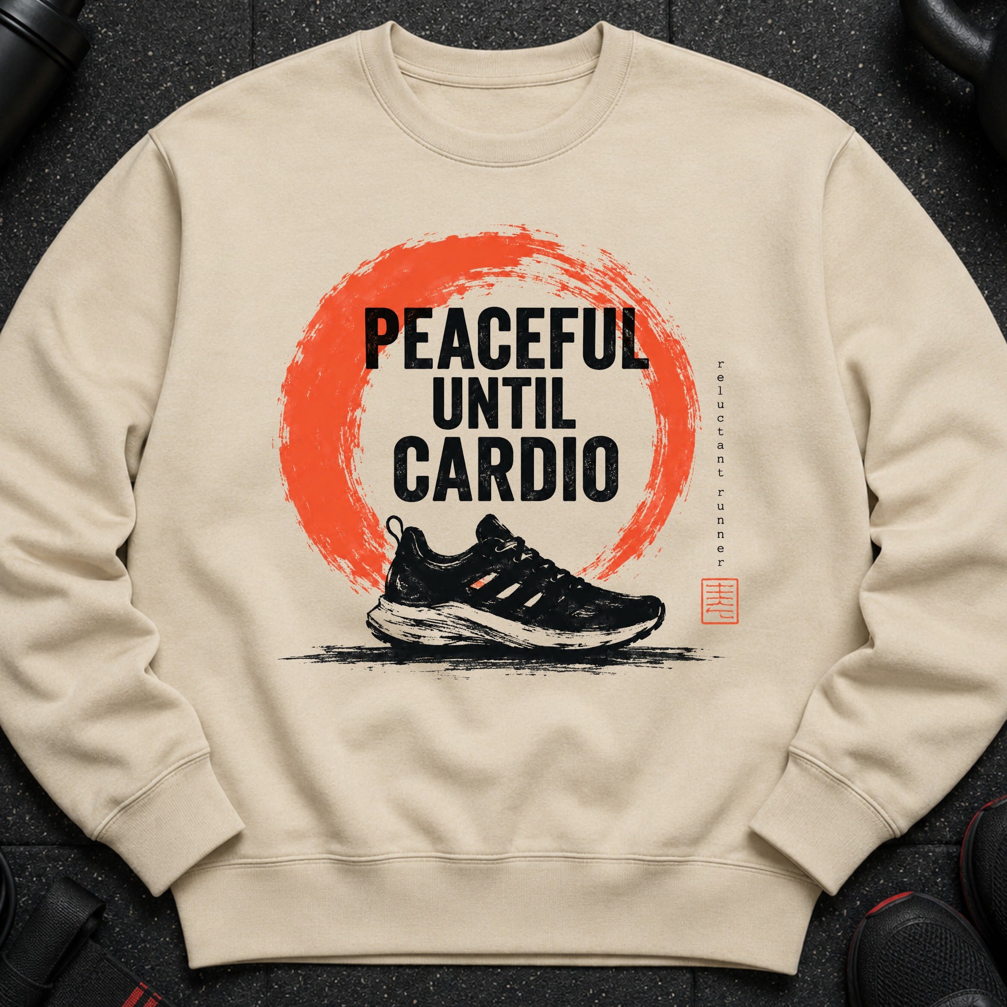 Light brown sweatshirt with "Peaceful Until Cardio" text and running shoe graphic.
