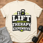 Cream t-shirt with "I Lift Because Therapy Is Expensive" graphic and kettlebell.