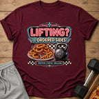 T-shirt with "Lifting? I Ordered Sides" text, onion rings, fries, and a kettlebell.