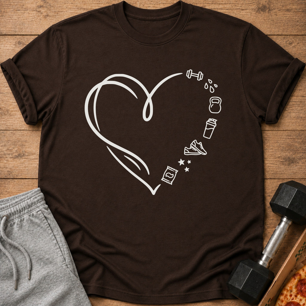 Brown t-shirt with white heart graphic and fitness icons, next to sweatpants and a dumbbell.