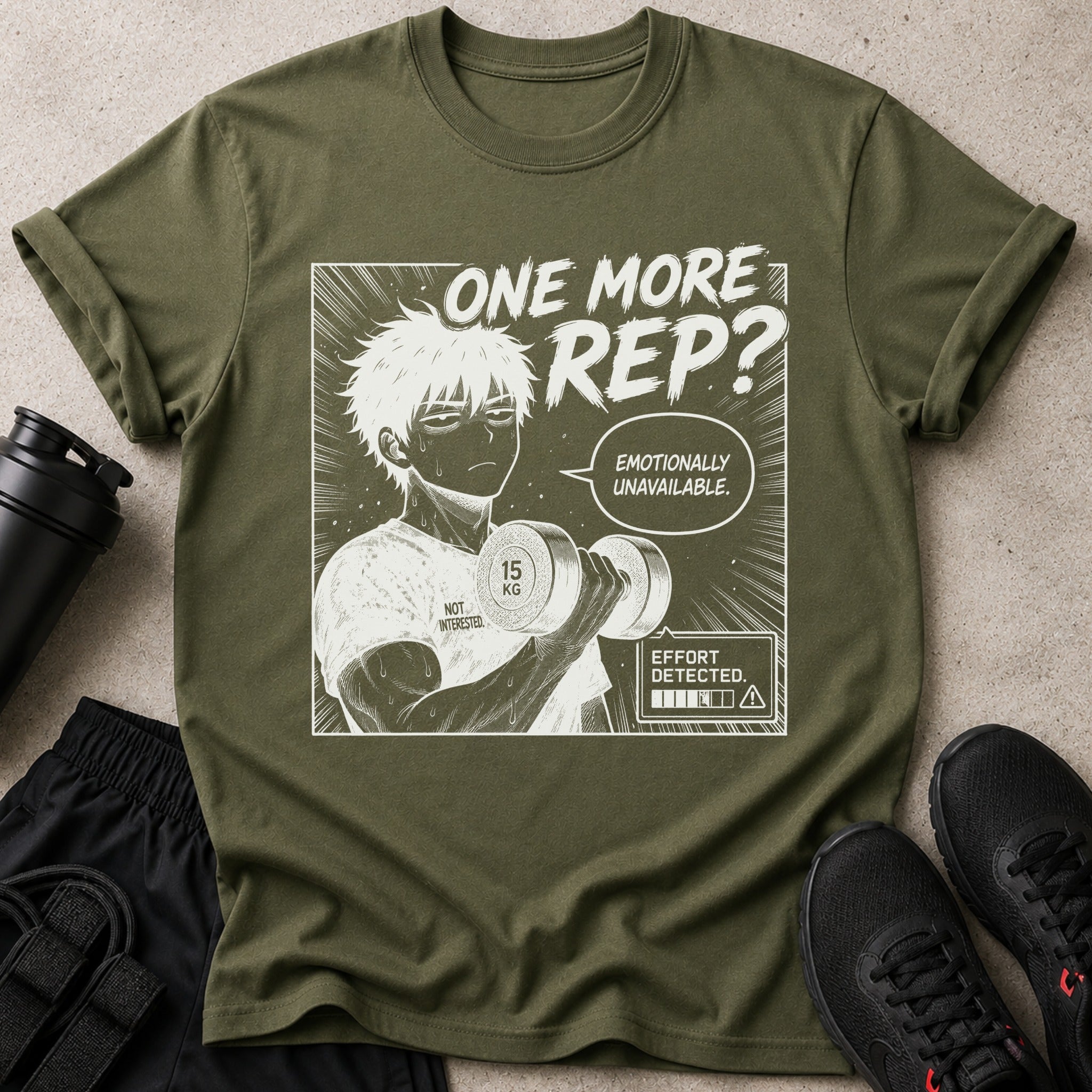 Olive green t-shirt with anime style graphic of a man lifting weights with text.
