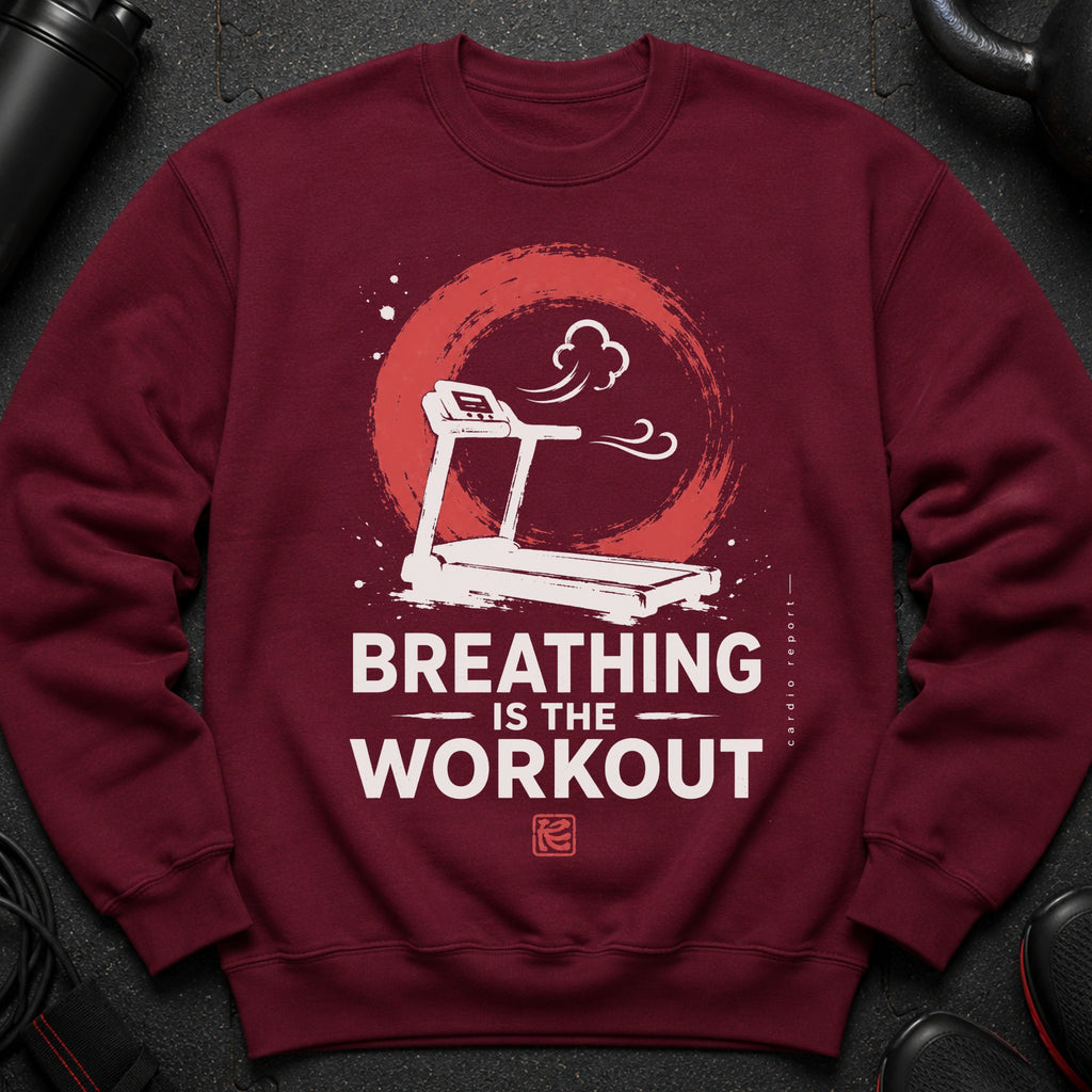 Maroon sweatshirt with graphic of treadmill and text "BREATHING IS THE WORKOUT".