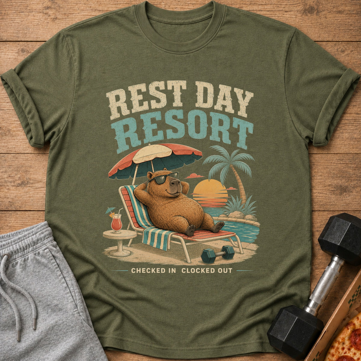 Capybara relaxing on beach chair with "Rest Day Resort" text and sunset scene.