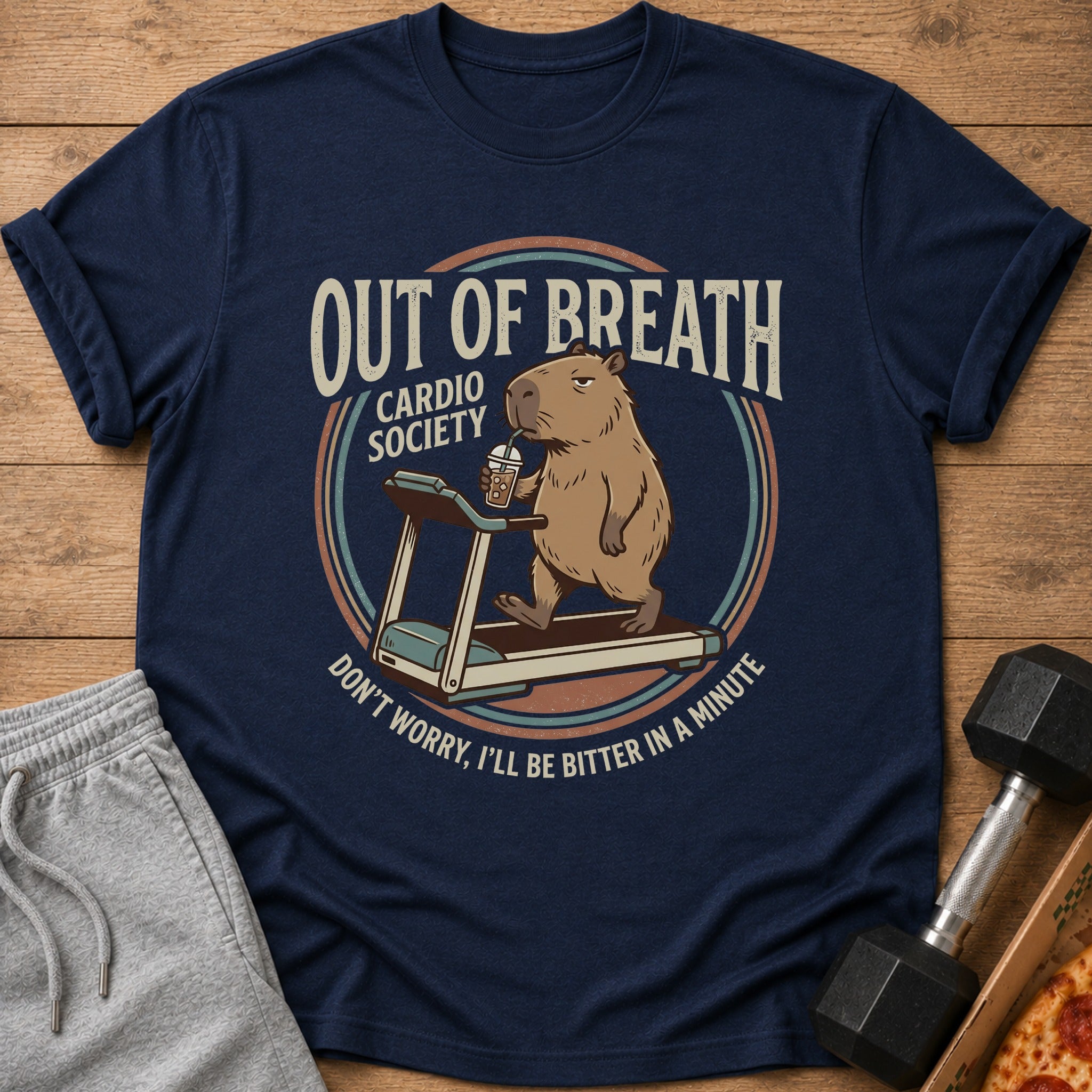 Navy t-shirt with capybara on treadmill graphic, text "Out of Breath Cardio Society".