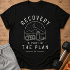 Black t-shirt with white text and graphics, "RECOVERY IS PART OF THE PLAN."