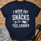 Navy t-shirt with text "I work out so my snacks feel earned" and graphic.