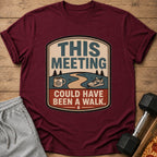 Maroon t-shirt with graphic: "THIS MEETING COULD HAVE BEEN A WALK."