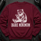 Maroon sweatshirt with a white graphic of a bear holding a dumbbell and the text "BARE MINIMUM".