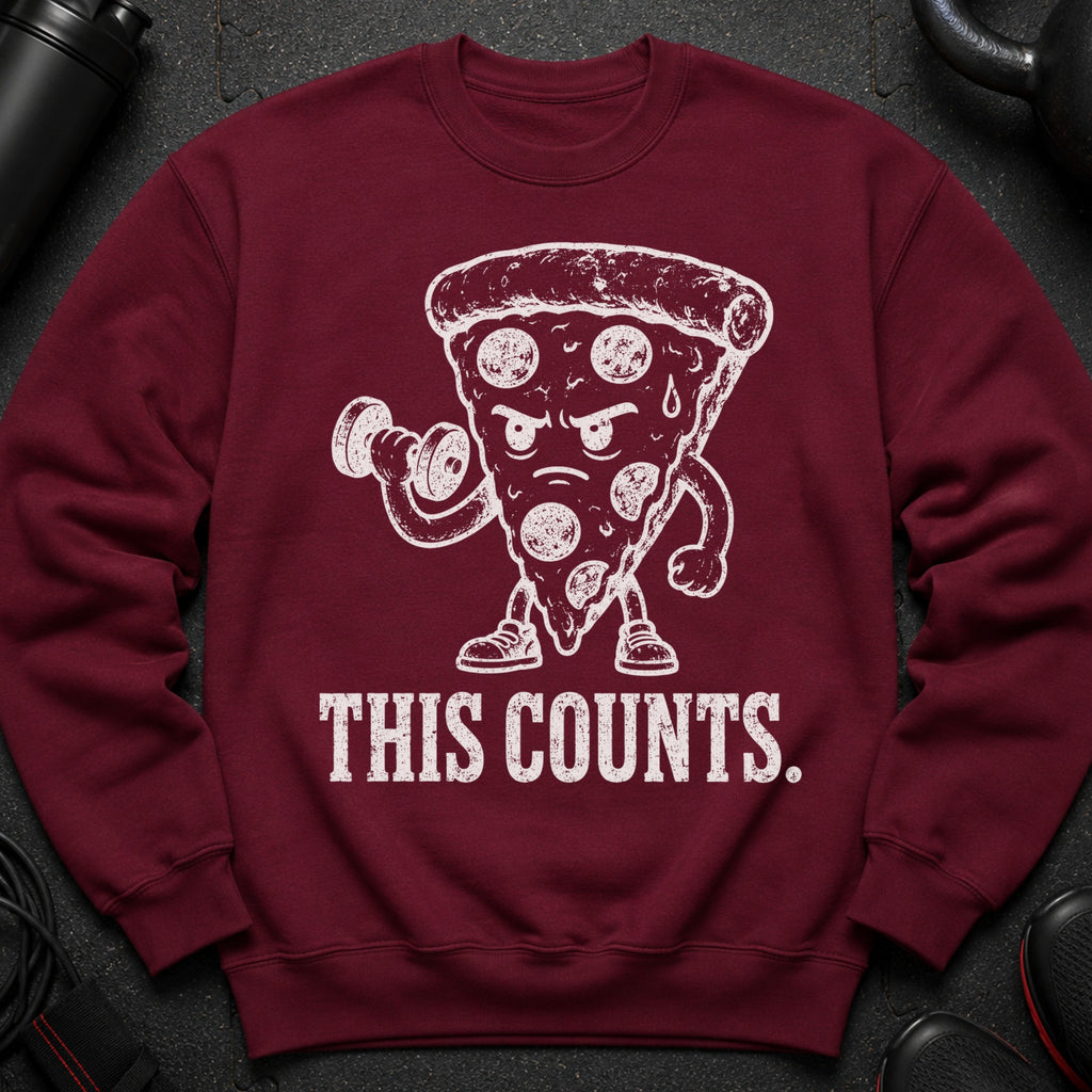 Maroon sweatshirt with white graphic of a pizza slice lifting weights and text "THIS COUNTS."