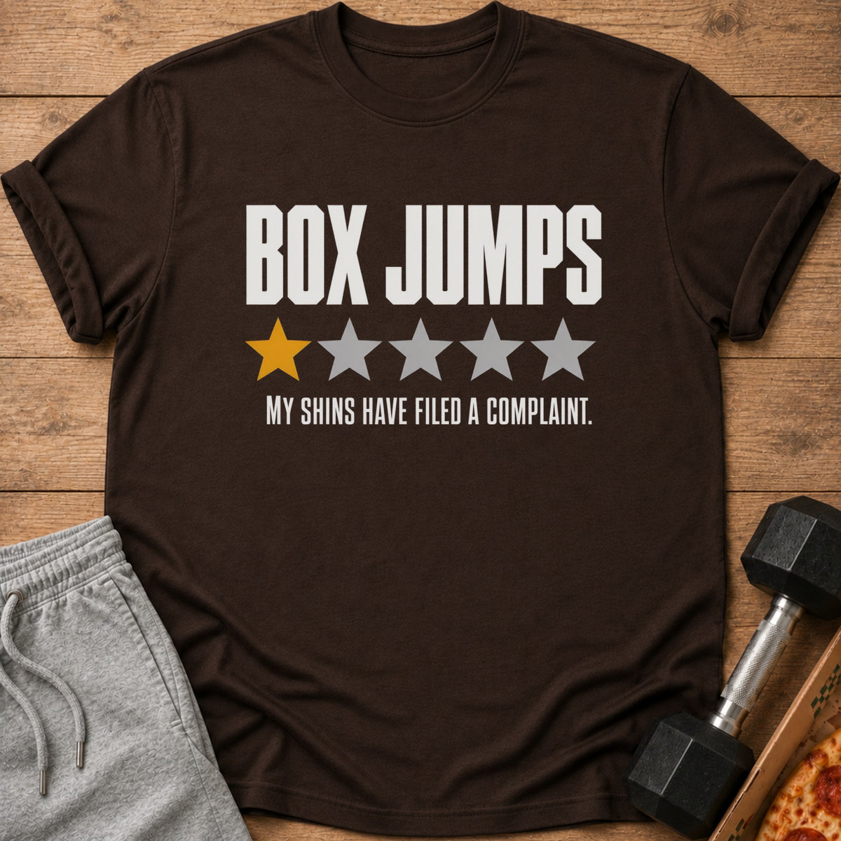 Brown t-shirt with "BOX JUMPS" and one star, rating "MY SHINS HAVE FILED A COMPLAINT."