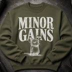 Green sweatshirt with distressed white text "MINOR GAINS" and a mouse lifting a dumbbell.