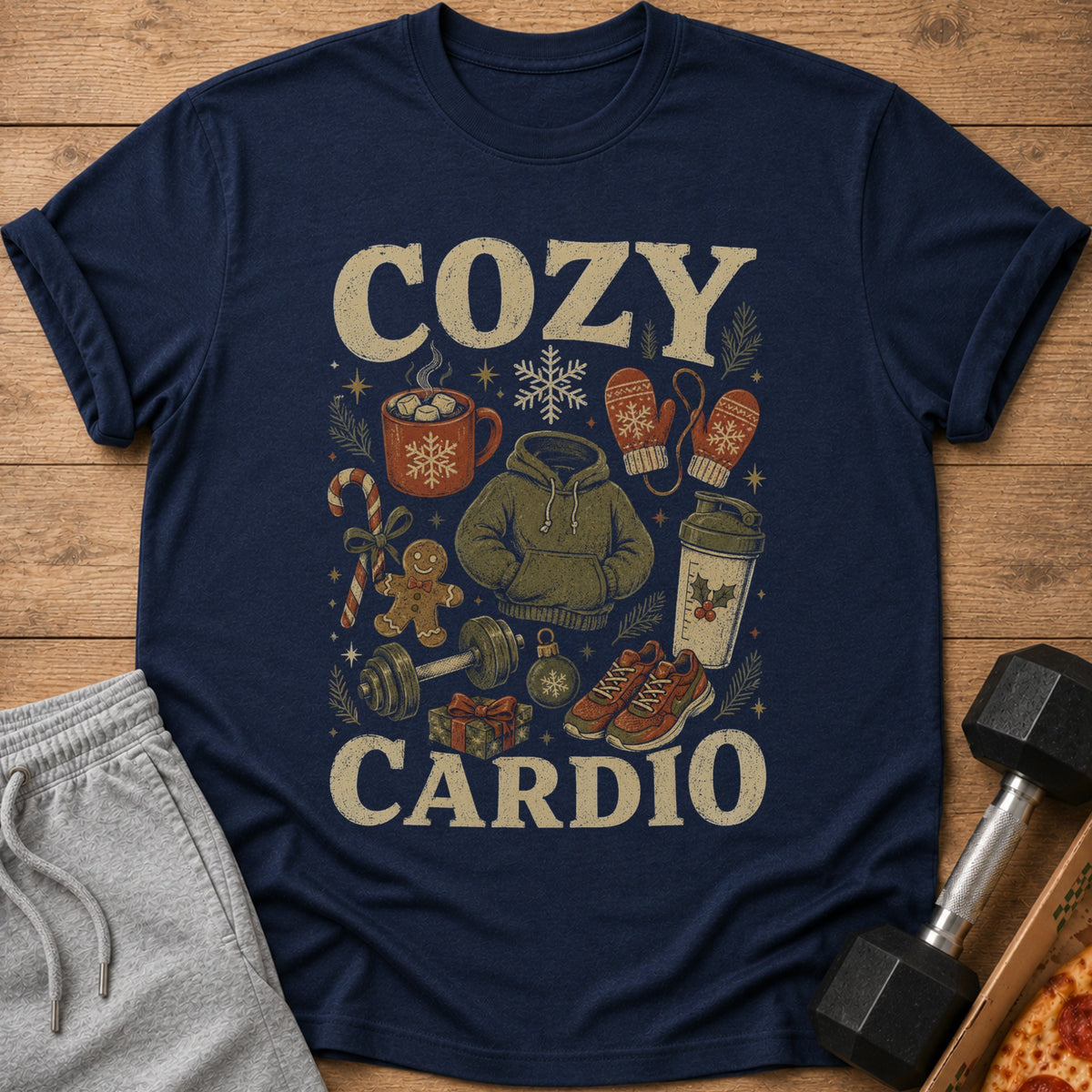 Navy t-shirt with "Cozy Cardio" text and Christmas-themed fitness icons.