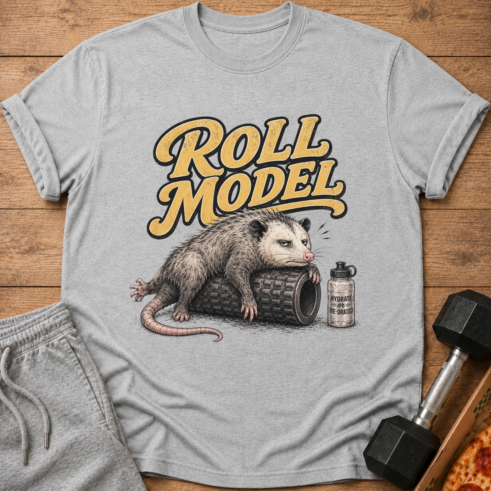 Opossum on foam roller with "Roll Model" text and "Hydrate or Die-Drated" water bottle.