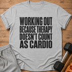 Gray t-shirt with black text reading "Working out because therapy doesn't count as cardio."