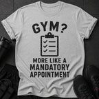 Gray t-shirt with "GYM? MORE LIKE A MANDATORY APPOINTMENT" text and checklist icon.