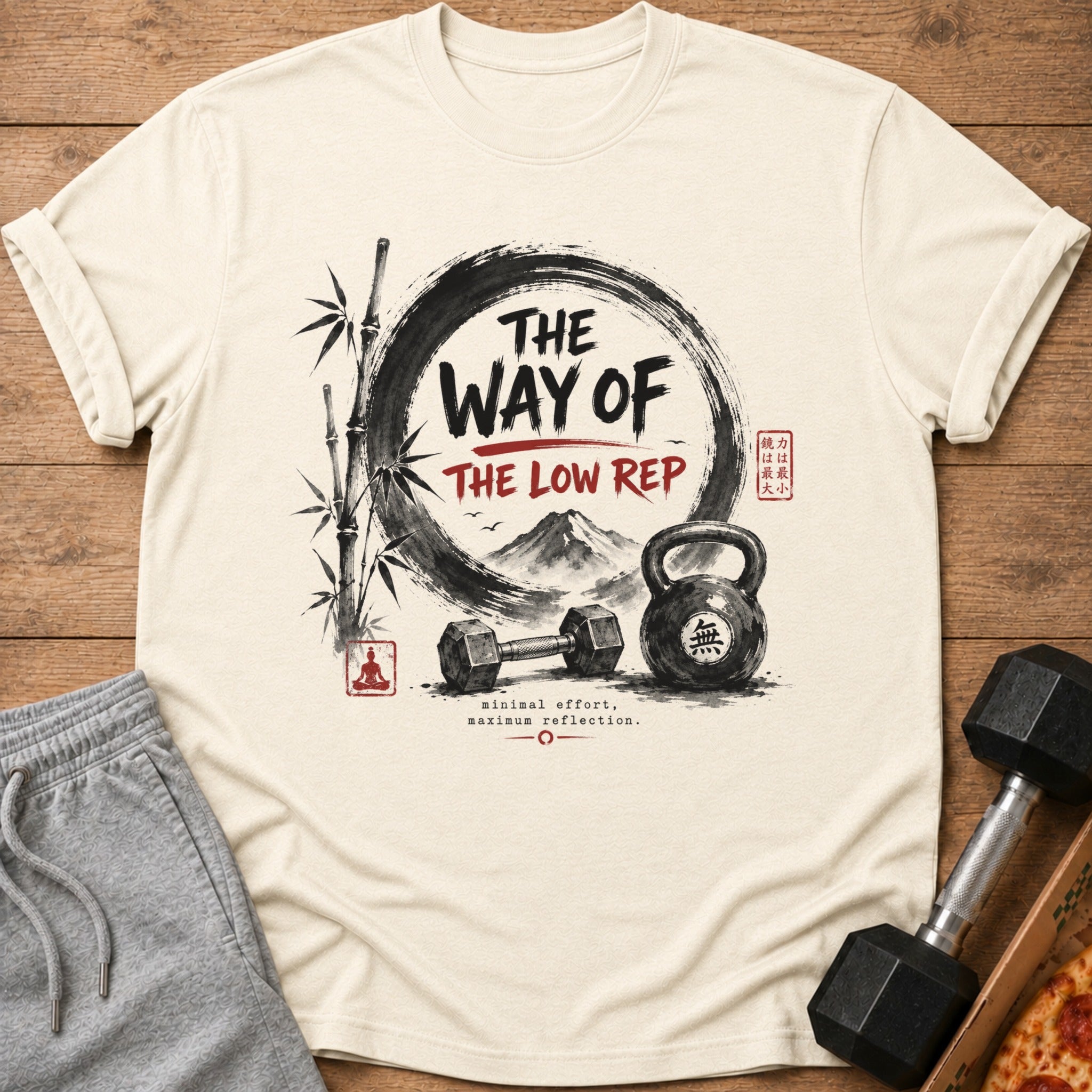T-shirt with "The Way of the Low Rep" text, dumbbell, kettlebell, and bamboo.