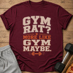 Maroon t-shirt with "Gym Rat? More Like Gym Maybe." text and barbell graphic.