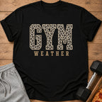 Black t-shirt with "GYM WEATHER" text in leopard print and cream.