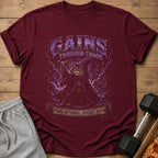 Maroon t-shirt with wizard cat lifting dumbbell graphic and text "GAINS THROUGH CHAOS".