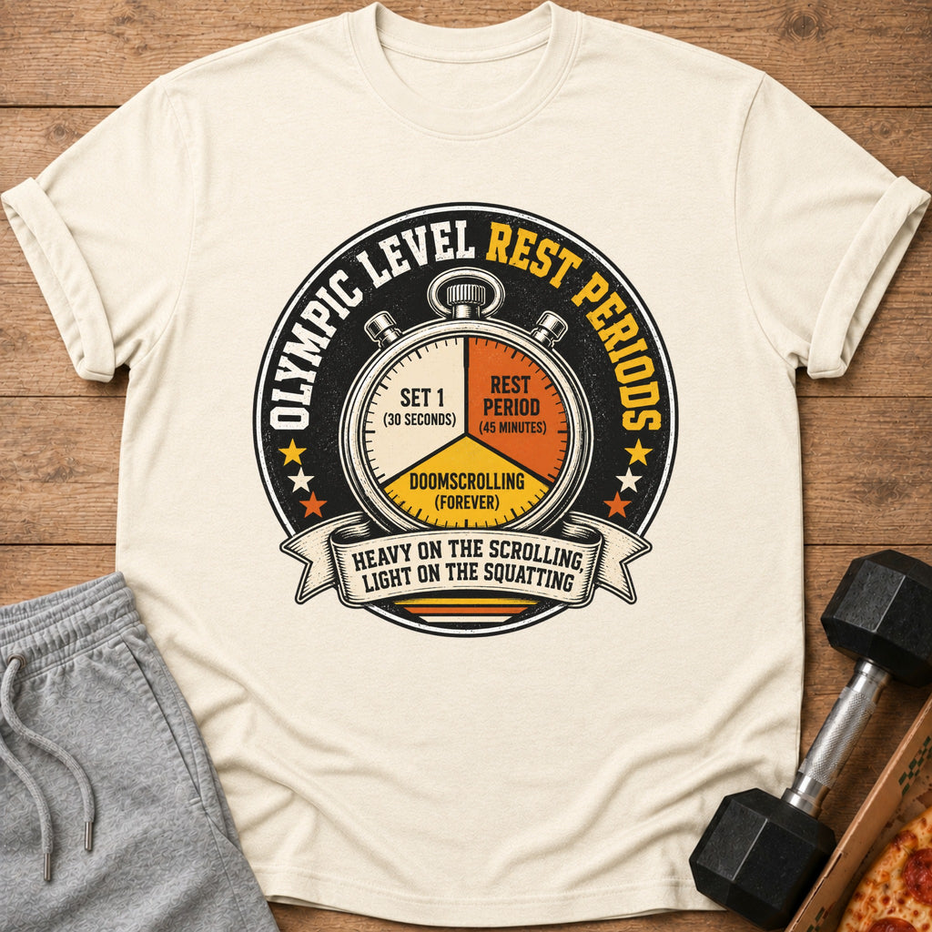 Cream t-shirt with "Olympic Level Rest Periods" graphic and humorous workout text.