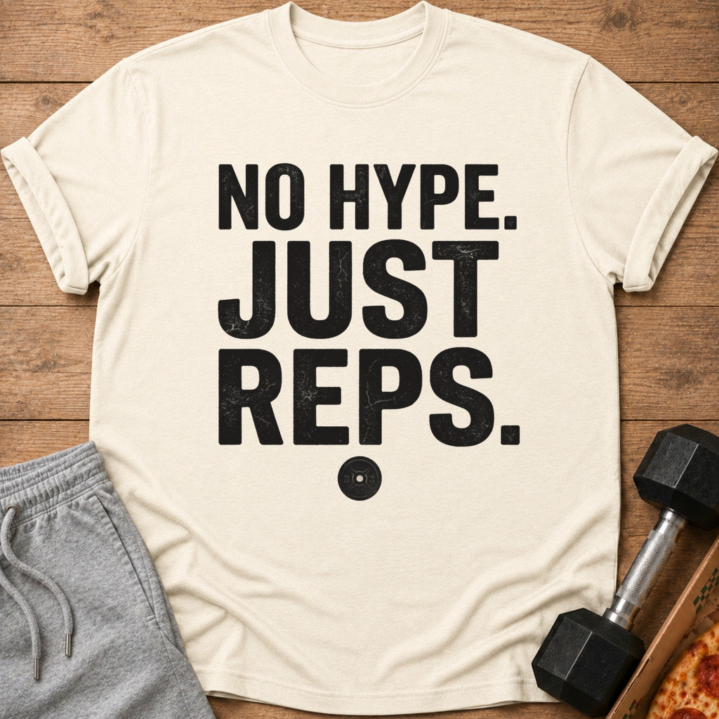 Cream t-shirt with black text "NO HYPE. JUST REPS." and a weight plate graphic.