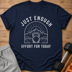 Navy t-shirt with white text and graphic of kettlebell, mountains, and sun.