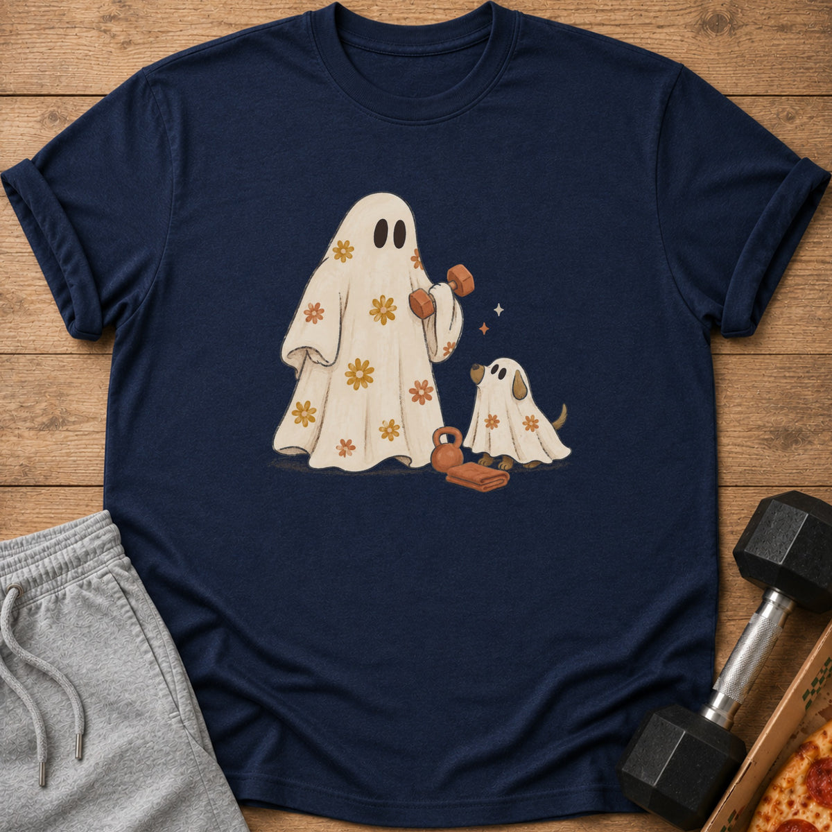 Navy t-shirt featuring ghosts, a dog, and fitness equipment with retro floral pattern.