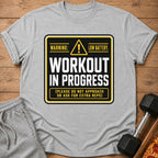 Grey t-shirt with "Workout In Progress, Low Battery" graphic.