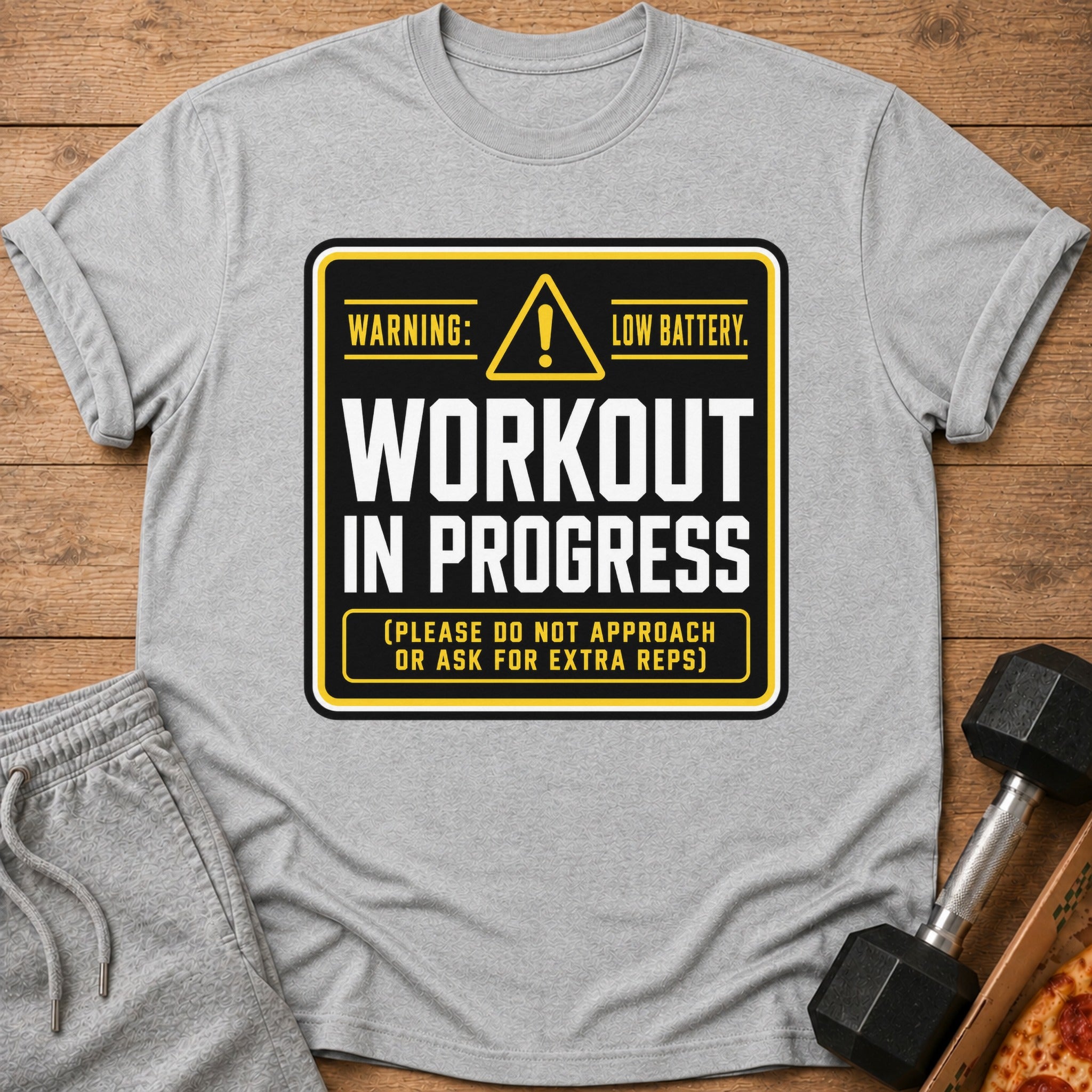Grey t-shirt with "Workout In Progress, Low Battery" graphic.