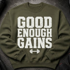 Olive green sweatshirt with "GOOD ENOUGH GAINS" and a dumbbell graphic.