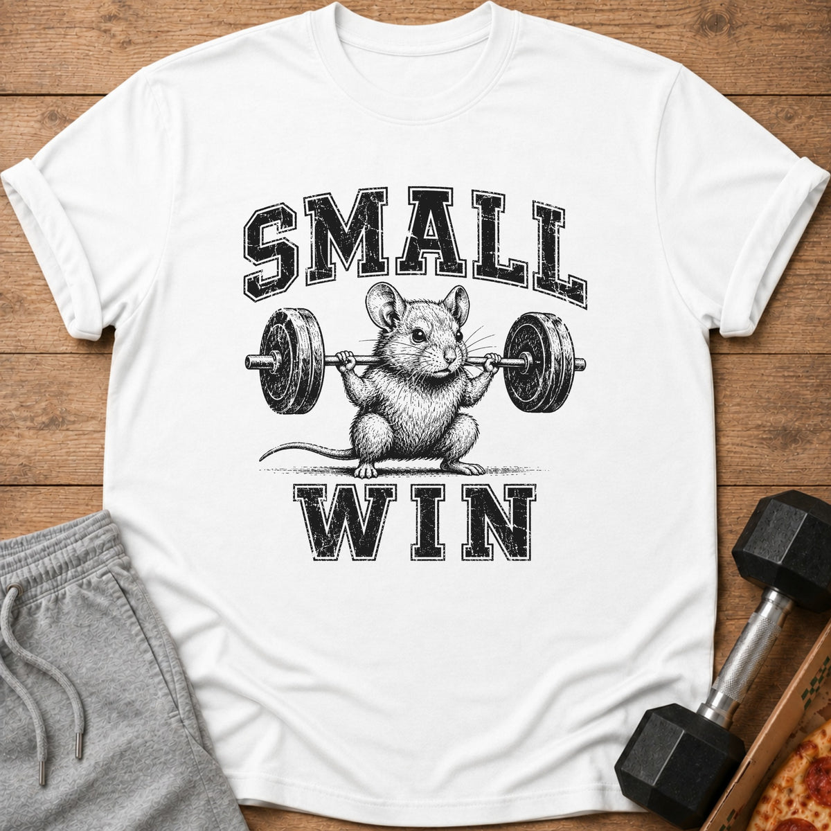 White t-shirt graphic of a mouse lifting weights with text "SMALL WIN".