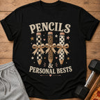 Black t-shirt with "PENCILS & PERSONAL BESTS" and decorated pencils.