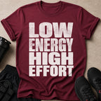 Maroon t-shirt with text "LOW ENERGY HIGH EFFORT" and workout gear.