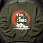 Olive green sweatshirt with "PEACEFUL UNTIL CARDIO" text and a running shoe graphic.